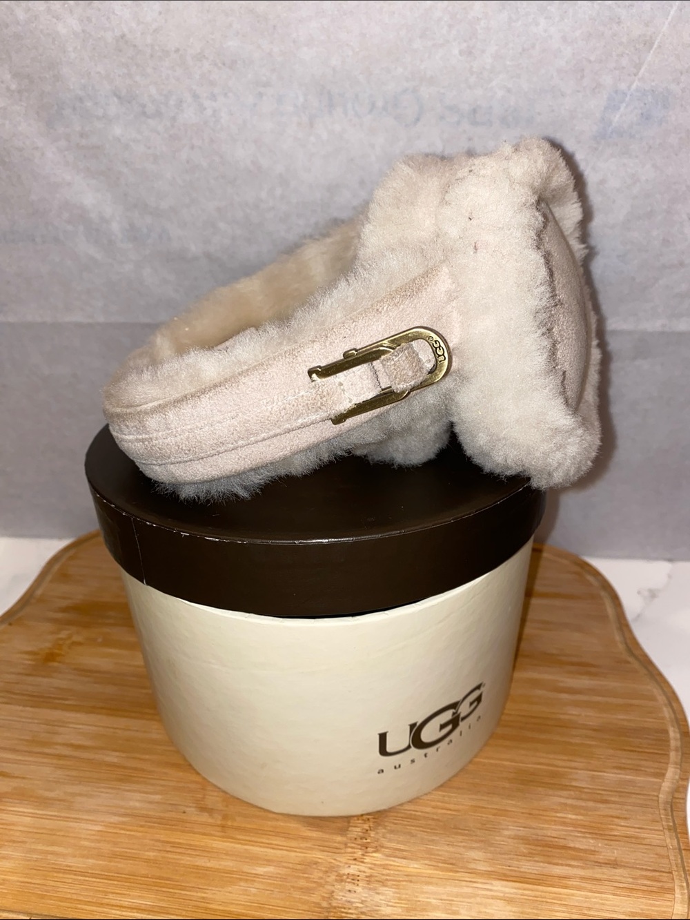 UGG Plush Shearling Ear Muffs in Light Beige with Gold Buckle